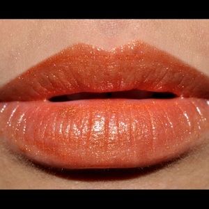 Limited edition authentic MAC Lipgloss Wind Me Up